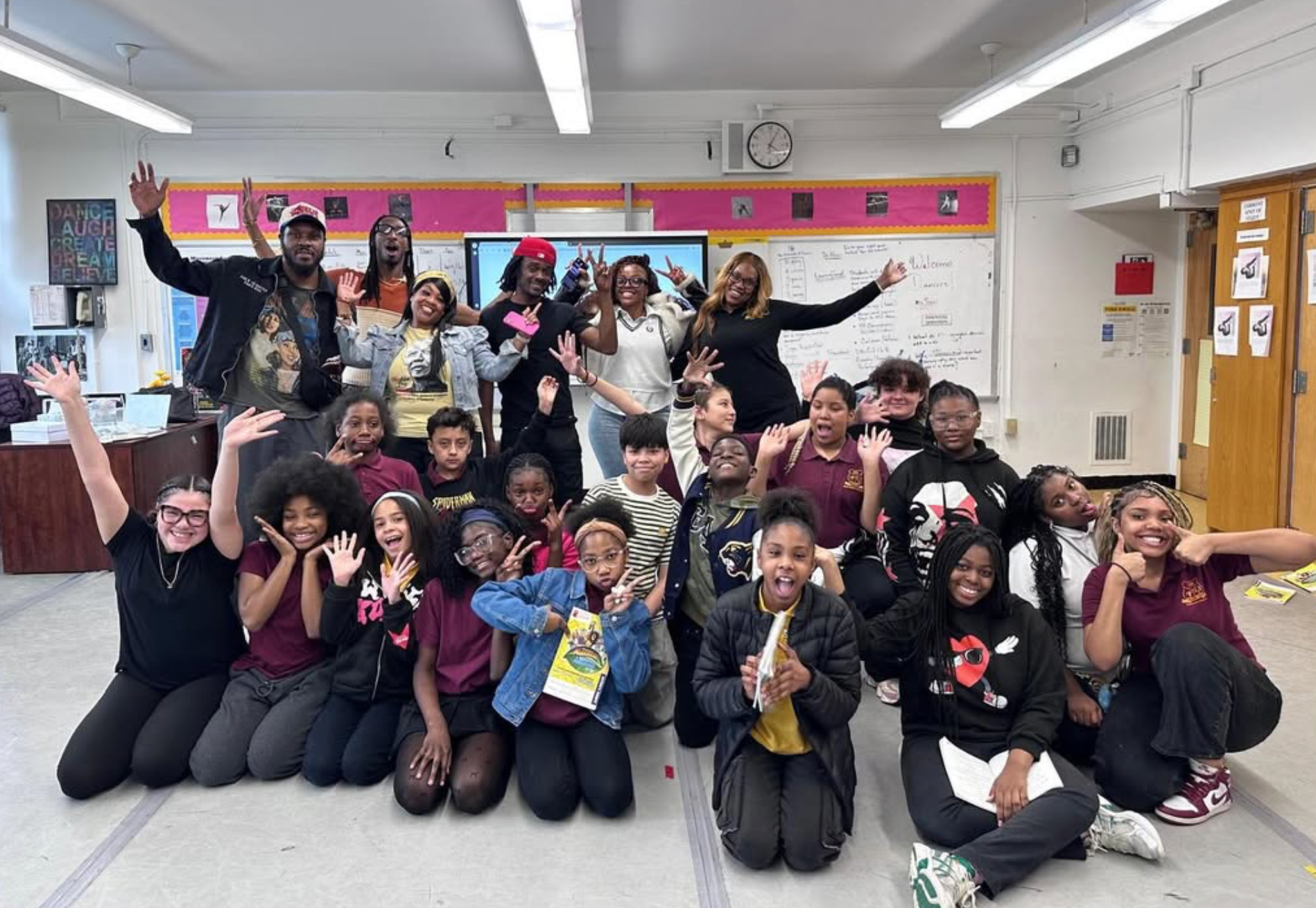 Madiba Prep scholars and staff gathered in a classroom.